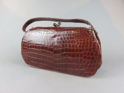 Vintage bag with brown crocodile style handle...