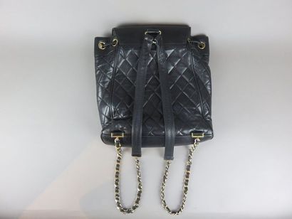 CHANEL Backpack in black quilted leather....