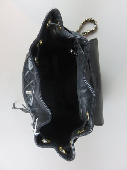 CHANEL Backpack in black quilted leather....