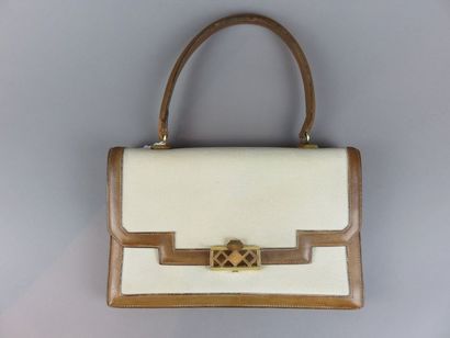 HERMES Handbag with handle in cream canvas,...