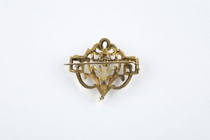 Broche/pendentif en or jaune et vert au décor...