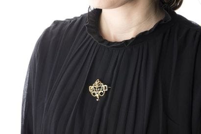 Broche/pendentif en or jaune et vert au décor...