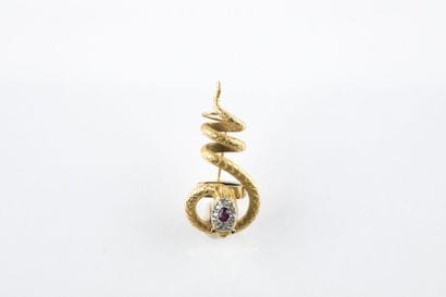 Broche en or jaune représentant un serpent,...