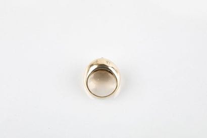 Bague dôme en or rose ornée en serti étoilé...