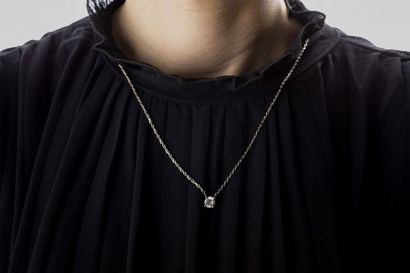 White gold pendant holding a 1 carat brilliant...