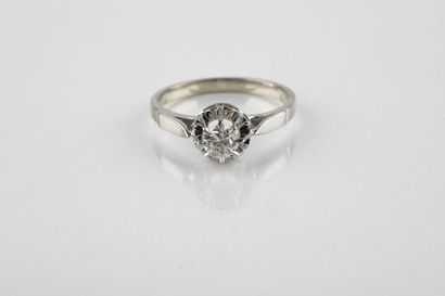 White gold and platinum diamond ring of about...