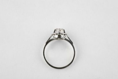 White gold and platinum diamond ring of about...
