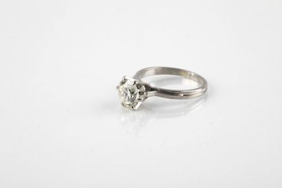 Solitaire platinum ring decorated with an...