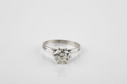Solitaire platinum ring decorated with an...