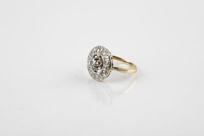 Daisy ring in yellow and white gold, adorned...
