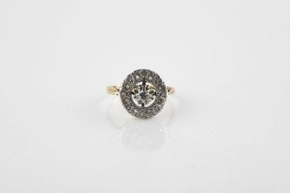 Daisy ring in yellow and white gold, adorned...