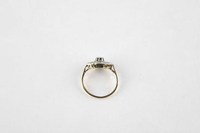 Daisy ring in yellow and white gold, adorned...