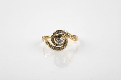Yellow gold ring, adorned in the center with...