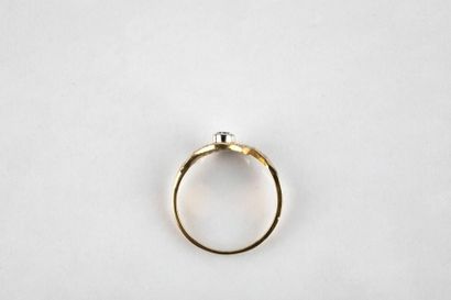 Yellow gold ring, adorned in the center with...