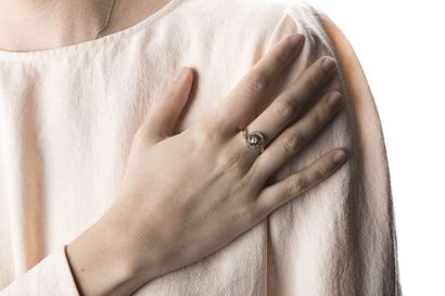Yellow gold ring, adorned in the center with...