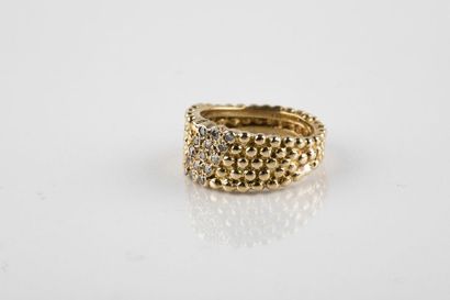 Yellow gold ring forming a pearl band, cut...