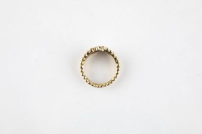 Yellow gold ring forming a pearl band, cut...