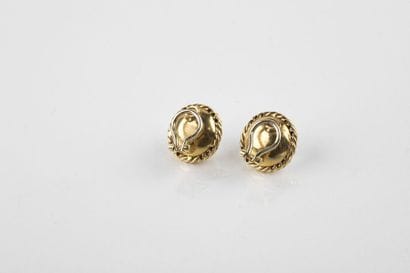 Pair of clip earrings adorned in the center...