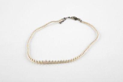 Necklace made of falling cultured pearls...