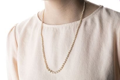 Necklace made of 129 pearls, a probably thin...