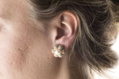 Pair of floral shaped clip earrings, decorated...