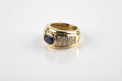 Yellow gold rush ring adorned in the center...