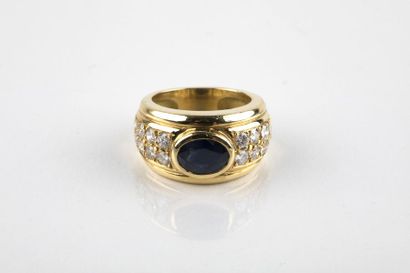 Yellow gold rush ring adorned in the center...