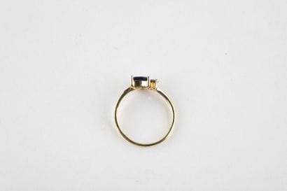 Yellow gold ring adorned with two pear-shaped...