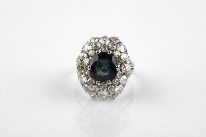 Platinum flower ring adorned in the center...