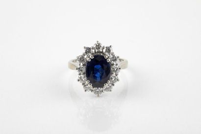 White gold daisy ring, adorned in the center...