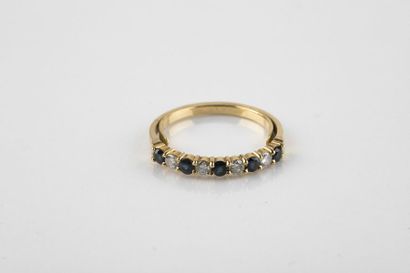 Half wedding ring in yellow gold, featuring...