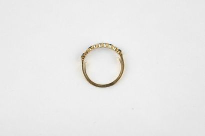 Half wedding ring in yellow gold, featuring...