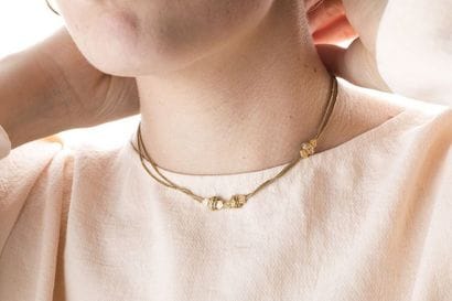 Yellow gold watch chain with three flows,...