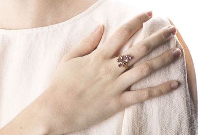 Yellow gold ring decorated with pear-shaped...