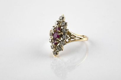 Marquise yellow gold ring, adorned with three...