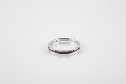 Half wedding ring in yellow gold set with...