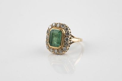 A yellow gold daisy ring, in the centre,...