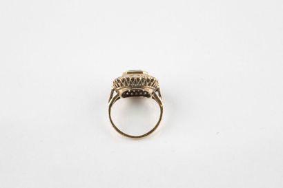A yellow gold daisy ring, in the centre,...