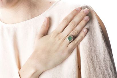 A yellow gold daisy ring, in the centre,...
