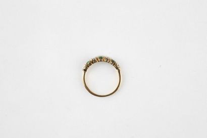 Half alliance in yellow gold with three round...