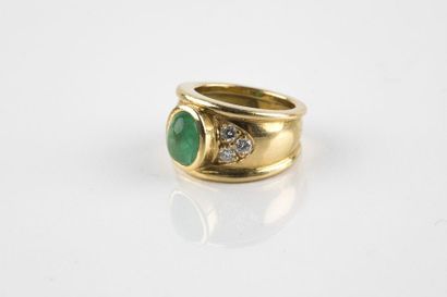 Yellow gold rush ring, adorned in the center...