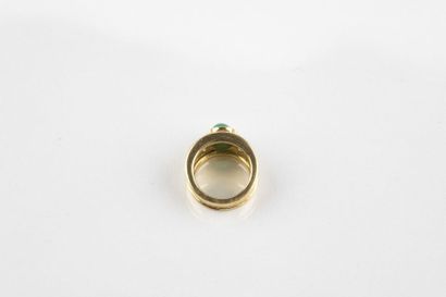 Yellow gold rush ring, adorned in the center...