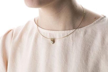 Rigid necklace, three parts, in yellow gold...