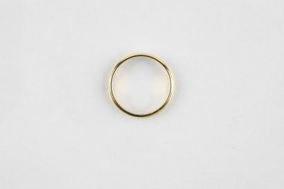 A yellow gold half wedding ring set with...