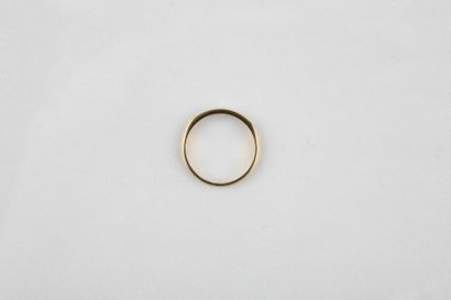 A yellow gold half wedding ring set with...