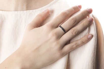 Half wedding ring set with black diamonds...