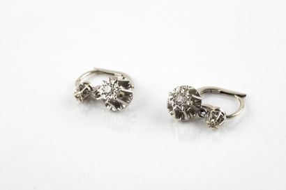 Pair of white and platinum gold earrings,...