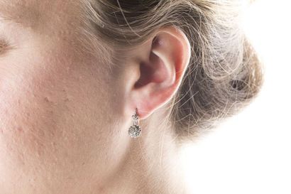 Pair of white and platinum gold earrings,...