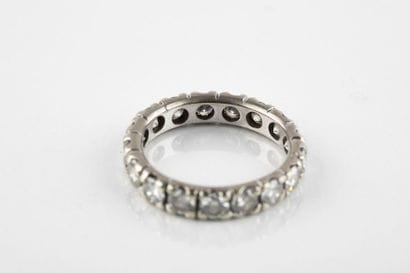 American white gold wedding ring, set with...