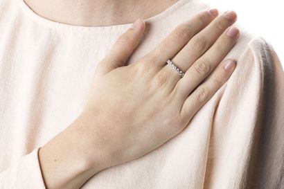American white gold ring holding twenty 2.7-carat...